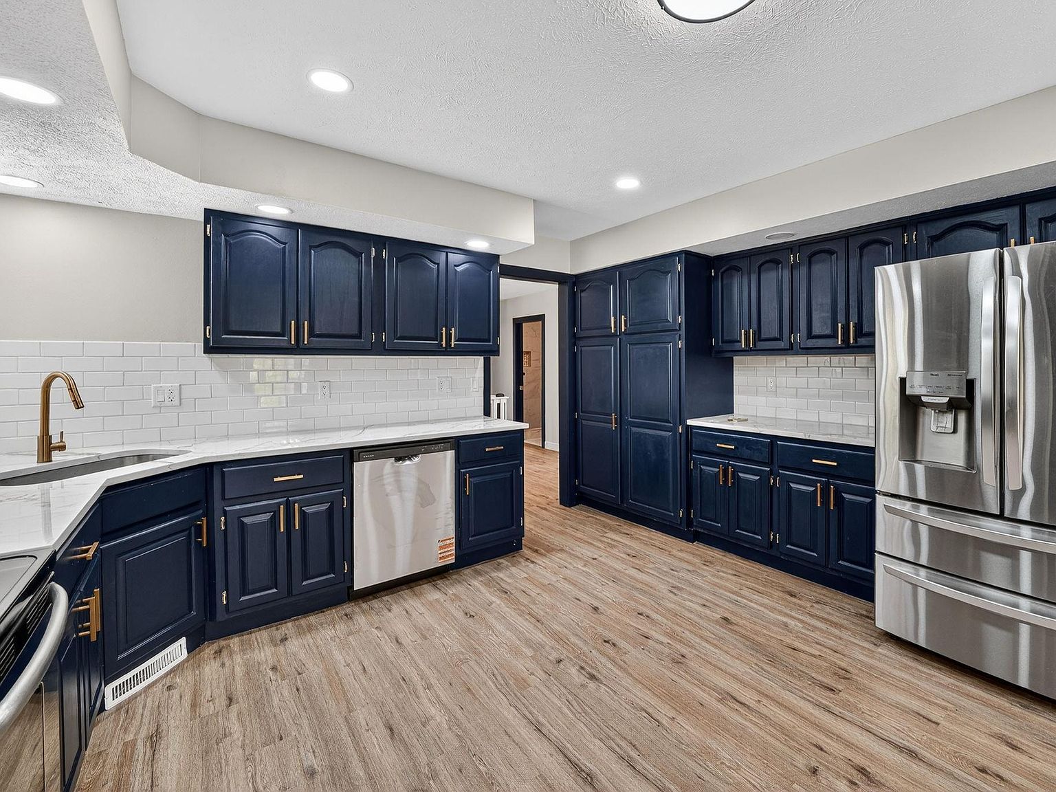 Full home renovation navy kitchen in Granger, Indiana